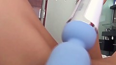 A spectacular redhead is filming her lesbian friend having fun with a vibrator and anal fingering